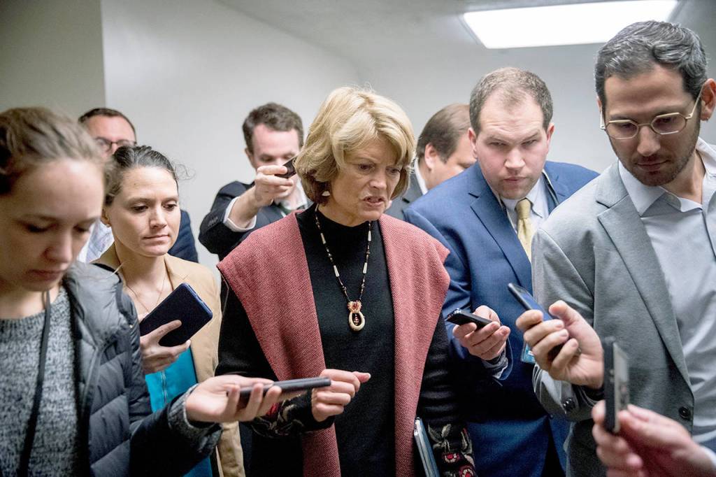 Sen. Lisa Murkowski, R-Alaska, speaks to reporters as she arrives at the US Capitol building on Capitol Hill in Washington on Thursday. (AP Photo/Andrew Harnik)