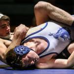 Granite Falls Hayden Long (left) works to pin Sultans Michael Moss during a meet on Jan. 24, 2019, at Sultan High School. (Kevin Clark / The Herald)