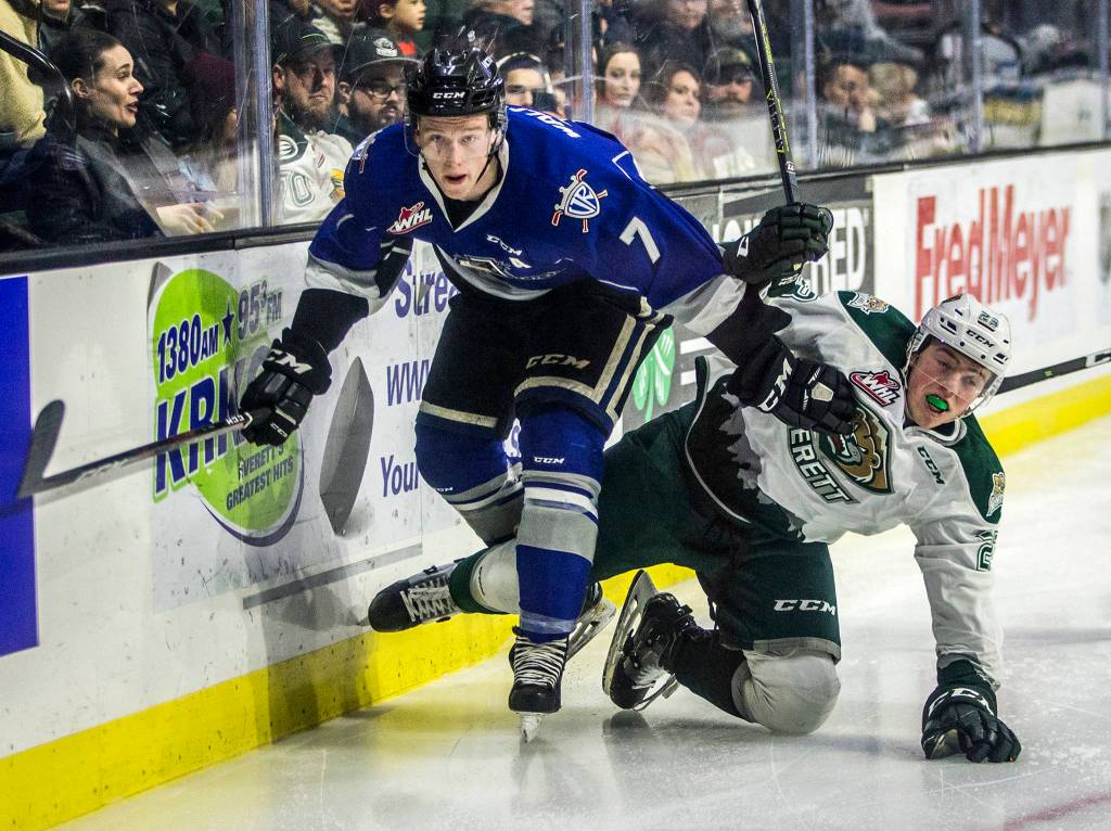 Silvertips Jake Christiansen is knocked down during the game against the Victoria Royals on Jan. 20 in Everett. (Olivia Vanni / The Herald)