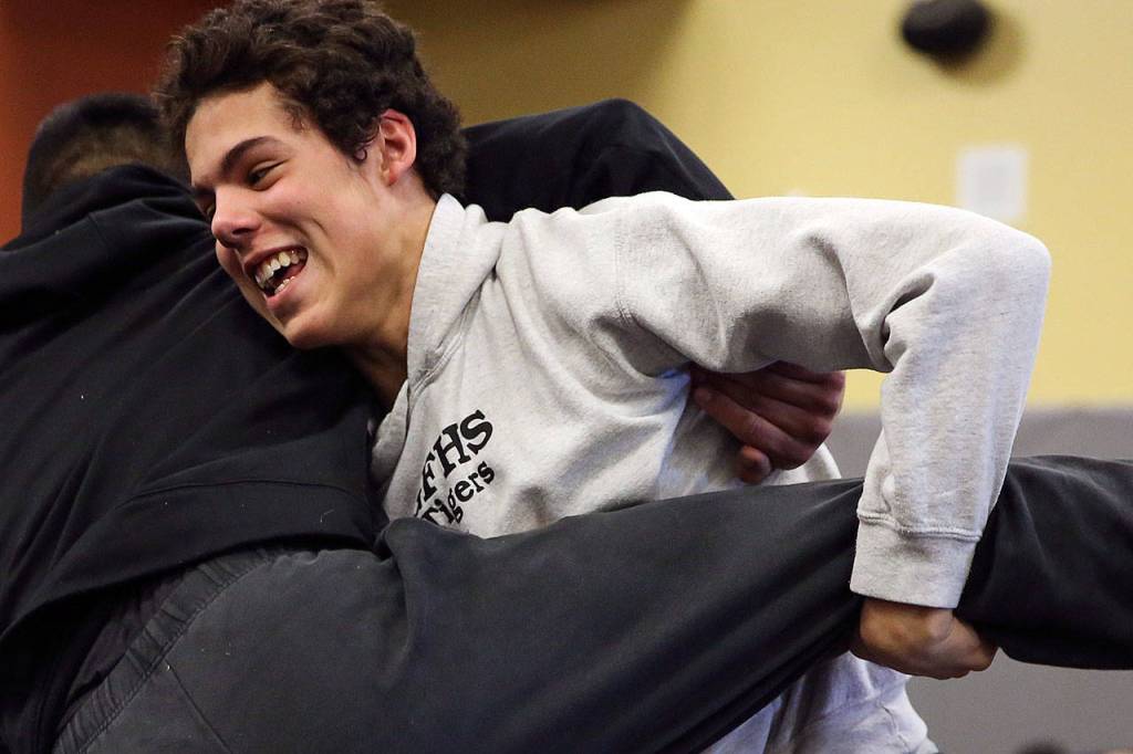 Granite Falls Mason McBride (right) wrestles teammate Antelmo Hernandez during practice Thursday in Granite Falls. McBride is one of a host of Tigers wrestlers with big postseason aspirations. (Kevin Clark / The Herald)