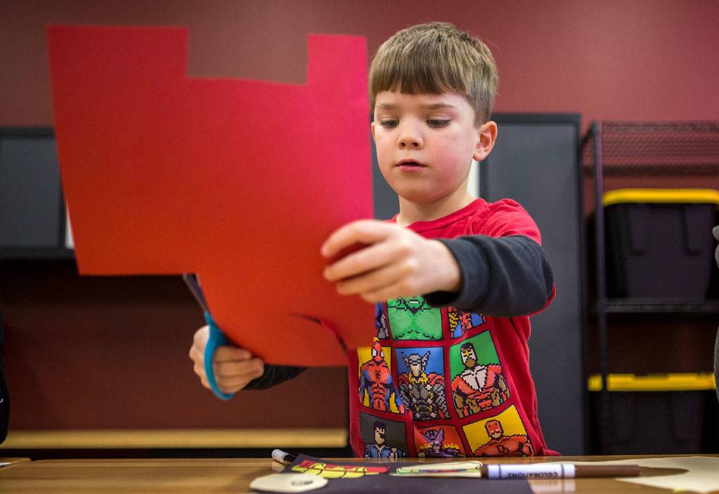 Colt Curtis, 7, works on an art project Jan. 24, at the Mukilteo Boys & Girls Club. (Olivia Vanni / The Herald)
