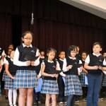 Submitted photo                                Fourth, fifth and sixth-grade students at St. Thomas More Parish School recently celebrated the legacy of Dr. Martin Luther King Jr. at an assembly. Part of their message said: Today we will gather in prayer to not only remember the sad history of slavery in our country and the fight against racism; but, to also join in prayer to ask God to bring unity and peace to our world.