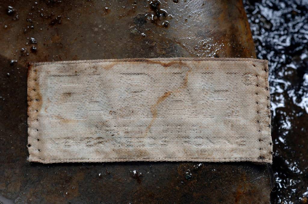 The dead mans tan pants had this Farah tag. (Snohomish County Medical Examiners Office)