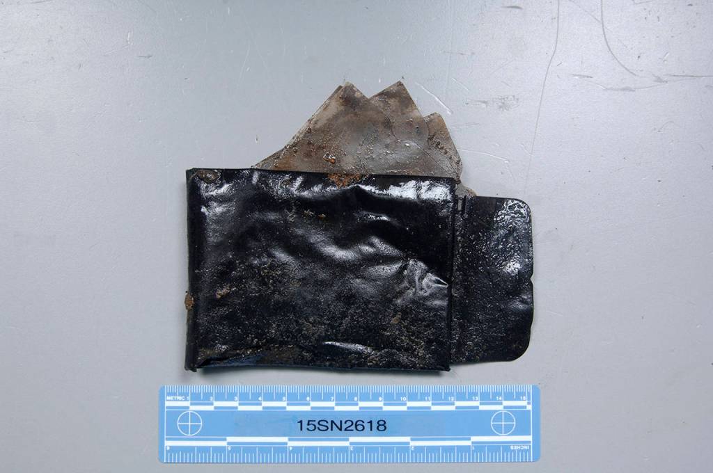 The dead mans leather wallet withstood tides and almost four decades in a grave. But if there was anything inside  like a drivers license or cash  it had deteriorated by Jan. 3, 1979. (Snohomish County Medical Examiners Office)