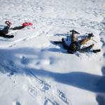 Don Sarver, left, and Kyle James, right, make snow angels on the Skyline Lake Trail on Saturday, Jan. 26, 2019 in Leavenworth, Wa. (Olivia Vanni / The Herald)