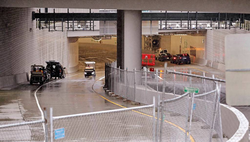 Fences surround the exit at the north portal of the new State Route 99 tunnel on Friday in Seattle. (AP Photo/Elaine Thompson)