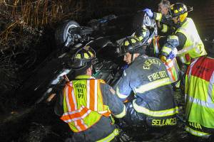 Woman rescued from car after 25 minutes trapped in icy water