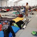 Central American migrants settle in a shelter at the Jesus Martinez stadium in Mexico City on Jan. 28. (AP Photo/Marco Ugarte, file)