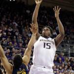 Washingtons Noah Dickerson (15) shoots over Californias Matt Bradley during the second half of a game on Jan. 19, 2019, in Seattle. Washington won 71-52. (AP Photo/Elaine Thompson)