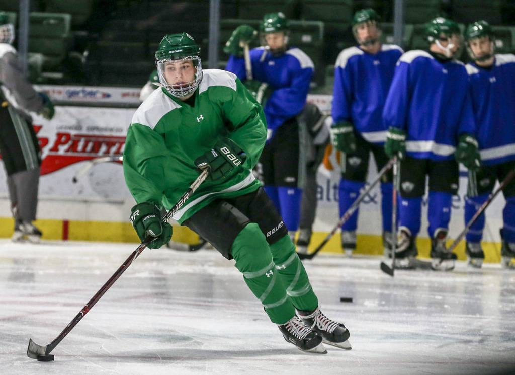 Maks Bure of the Everett Jr. Silvertips runs through a drill during a team practice on Jan. 31 at Angel of the Winds Arena in Everett. (Kevin Clark / The Herald)
