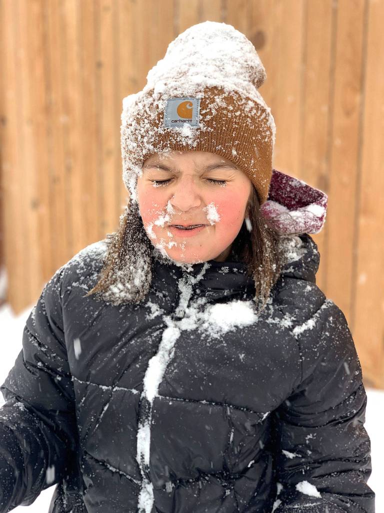 Ariana Gebow, 14, of Marysville, had just been hit with a snowball to the face before Mom snapped this shot. Her brother Darren Gebow, 12, scored the bulls-eye. (Georgia Gebow)