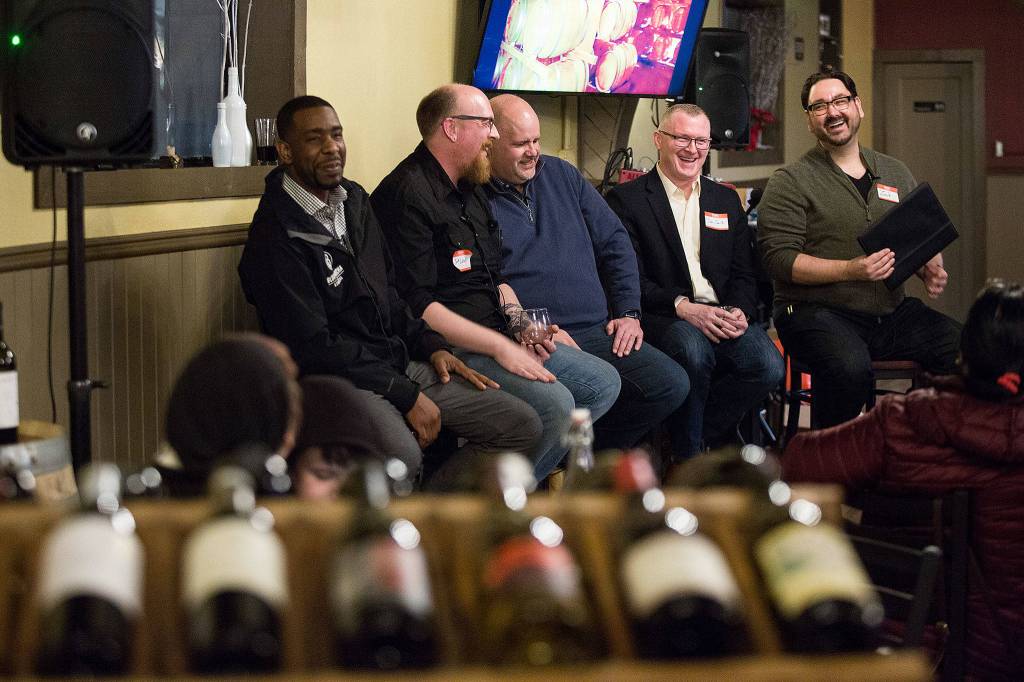 Zach Zulauf (right), organizer of Seattle Foodtrepreneurs right, gets speakers laughing during a gathering sponsored by the city and business alliance to help nurture the citys entrepreneurs at the Double Barrel Wine Bar on Jan. 24 in Snohomish. (Andy Bronson / The Herald) Zach Zulauf, organizer of Seattle Foodtrepreneurs,