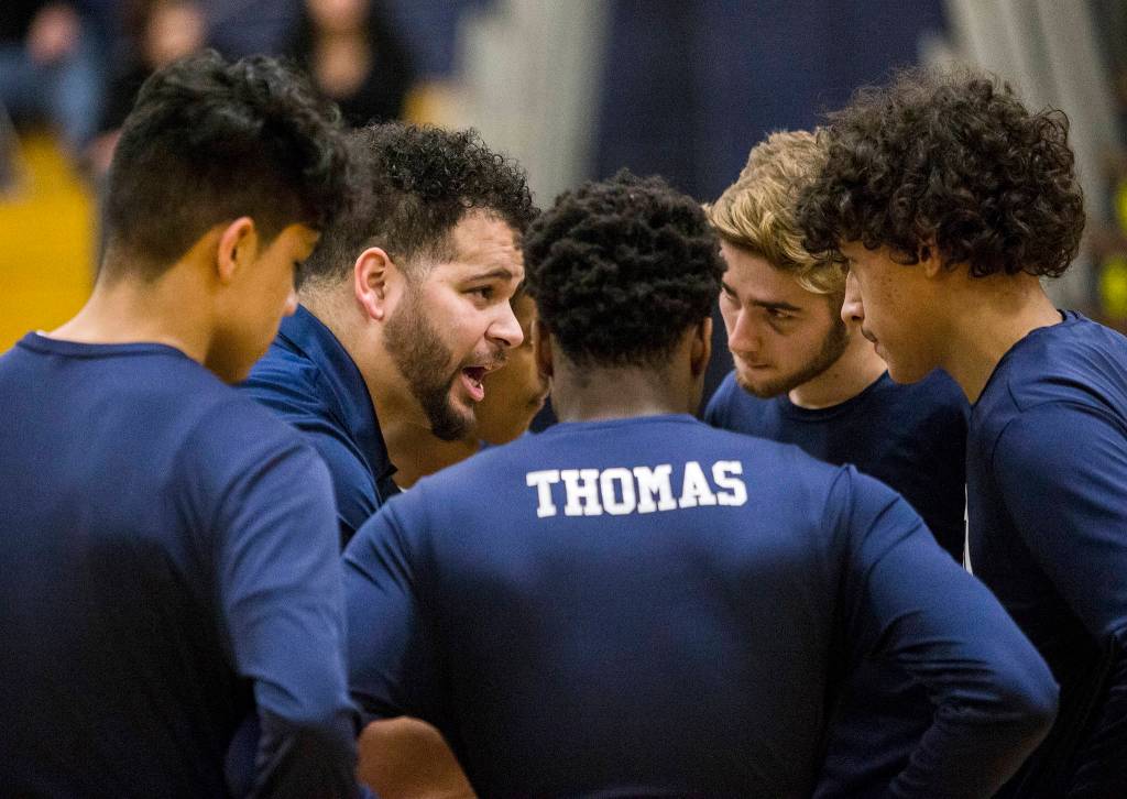 Tevin Dillon talks to his players before the game against Mount Vernon on Jan. 30 in Everett. (Olivia Vanni / The Herald)