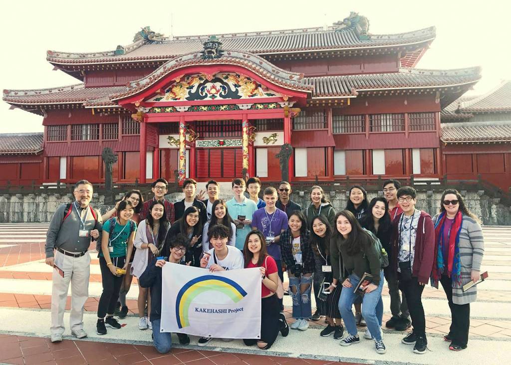 Kamiak High School students and teachers pose at the entrance to Shuri Castle in Naha, Japan. (Submitted photo)