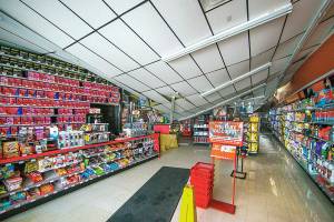 The interior of AutoZone on Evergreen Way in Everett is shown Wednesday after its roof collapsed Tuesday night. (Mike Siegel/The Seattle Times via AP)