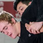 Chris Shaffer works to free himself from Kaige Bunsngeam during a Wednesday practice session in Everett. (Kevin Clark / The Herald)