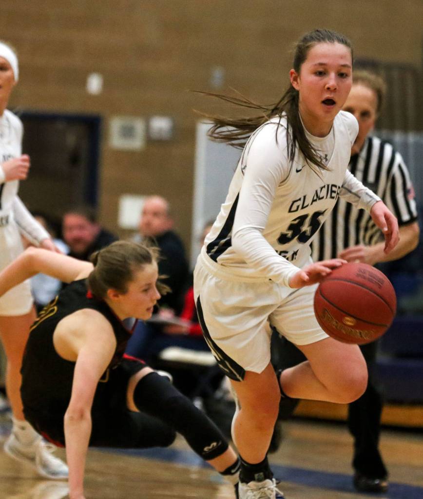 Glacier Peaks Maya Erling steals the ball from Newports Eva Richards on Thursday at Glacier Peak High School. (Kevin Clark / The Herald)