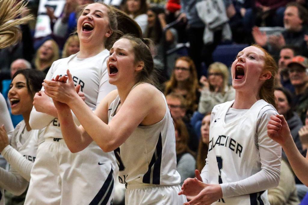 Glacier Peak players cheer Thursday at Glacier Peak High School. (Kevin Clark / The Herald)