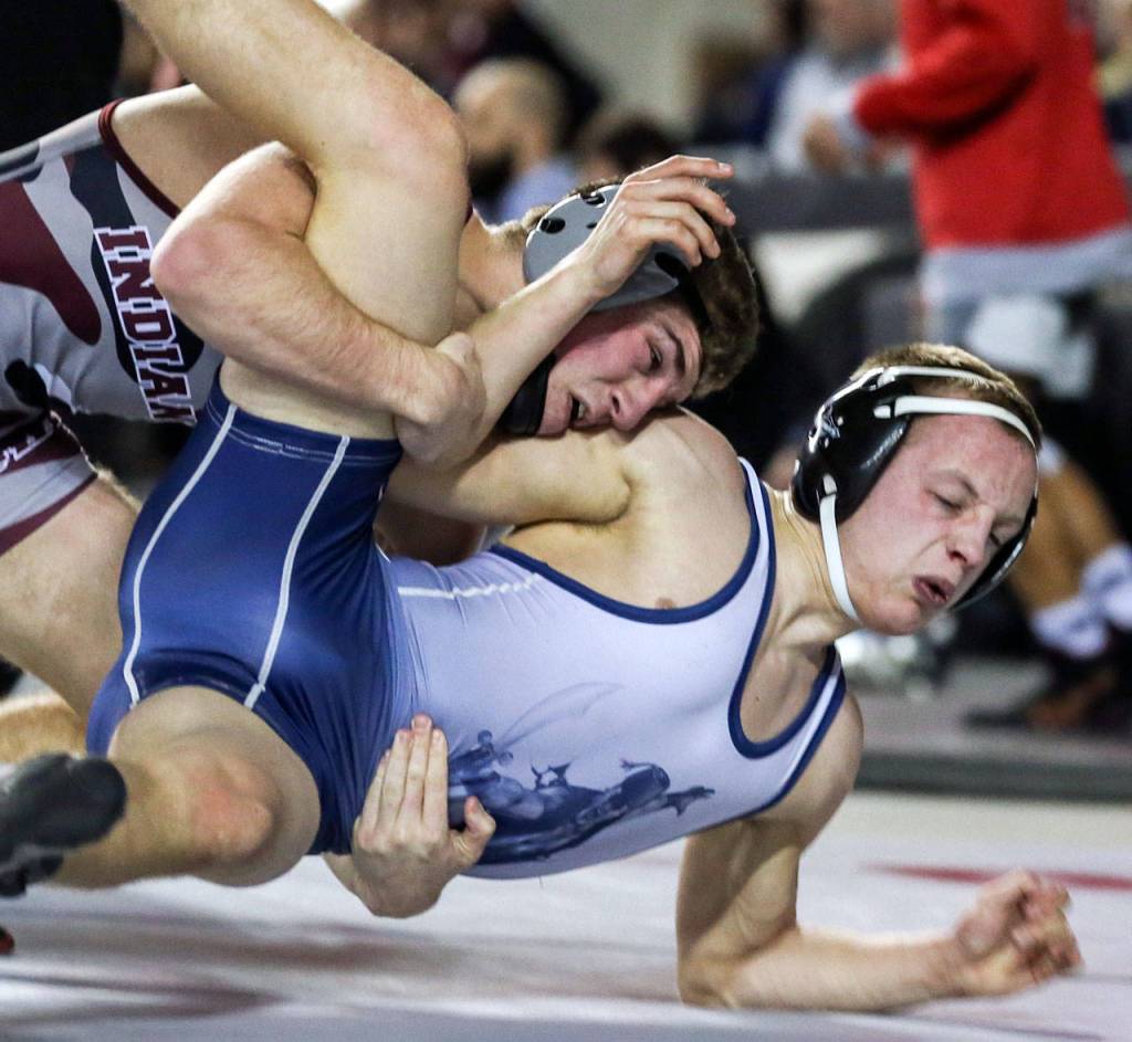 Sultans Aidan Fleming (right) finishes to second in state to Coalvilles Trent Baun in 1A 132 weight class Saturday night during the Mat Classic XXXI at the Tacoma Dome on February 15, 2019 in Tacoma. (Kevin Clark / The Herald)