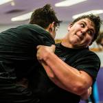 Devin Kylany attempts to take down teammate Wyatt Hall during practice on Feb. 13 in Lake Stevens. (Olivia Vanni / The Herald)