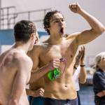 Shorewood senior Jack Brodersen pumps his fist in the air after his teams sixth-place finish in the 200 medley relay. (Olivia Vanni / The Herald)