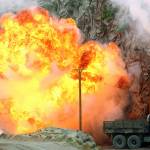 An explosion strikes during a military demonstration targeting a theatrical ballistic missile launchpad at the International Defense Exhibition and Conference in Abu Dhabi, United Arab Emirates, on Sunday. (AP Photo/Jon Gambrell)