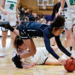 Glacier Peaks Aaliyah Collins dives for a loose ball. (Andy Bronson / The Herald)