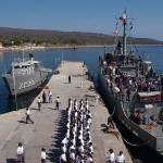 Inmates line up on the pier after arriving at the Islas Marias federal prison island, located 90 miles south of Mazatlan, Mexico, on May 12, 2005. President Andres Manuel Lopez Obrador said on Monday that he will close the famed island penal colony and will have it converted into a cultural and environmental education center. (AP Photo/Eduardo Verdugo, File)