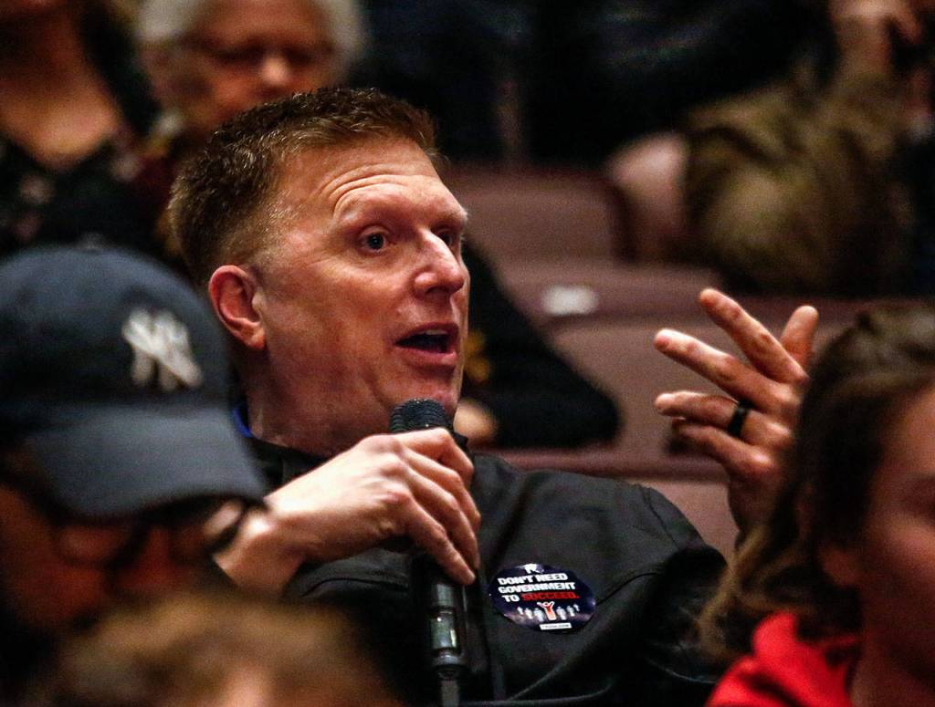 Todd Reihing, father of Jackson student and Turning Point USA member Jack Reihing, asks a question after Kyle Kashuvs talk. (Dan Bates / The Herald)