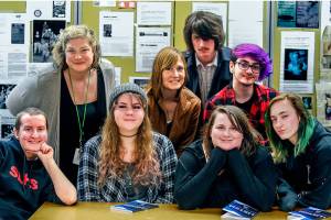 Scriber Lake students and staff are celebrating the publication of their seventh book. It includes stories of personal struggles, addiction, failure, anxiety and more. Gathered are, (from front left) Jenna Jensen, 17, Mindy Filla, 18, Moniline Winston, 18, and Bailey Frisbie, 17. From left top, librarian Leighanne Law, teacher Marjie Bowker, Joey Walker, 16, and Reese Olds-Craig, 17. (Dan Bates / The Herald