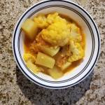Potato-cauliflower curry is a hearty Indian dish best served hot. (Megan Campbell / The Herald)