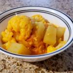 Potato-cauliflower curry is a hearty Indian dish best served hot. (Megan Campbell / The Herald)