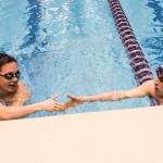Jacksons Justin Limberg shakes hands North Creeks Brandon Stride after competing in the Mens 100 Yard Breaststroke uring the 4A Boys Swim/Dive Championships on Saturday, Feb. 16, 2019 in Federal Way, Wash. (Olivia Vanni / The Herald)