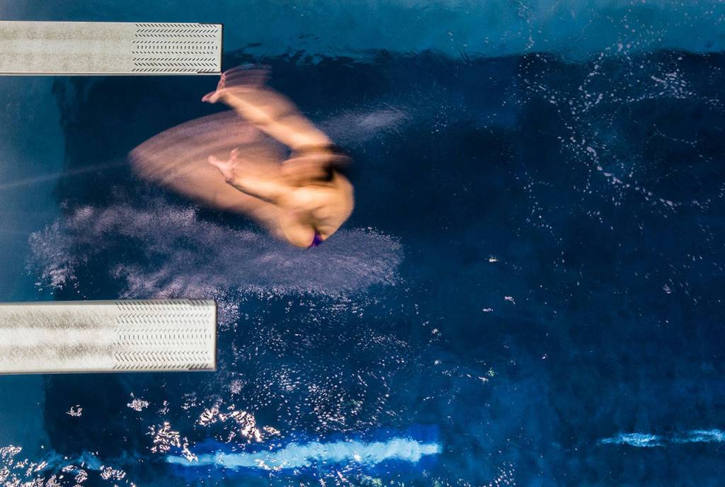 Issaquahs Robert Gref warms up before the Mens 1 Meter Diving during the 4A Boys Swim/Dive Championships on Saturday, Feb. 16, 2019 in Federal Way, Wash. (Olivia Vanni / The Herald)