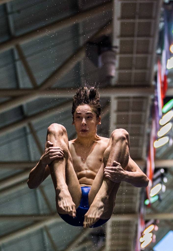 Shorewoods Isaac Poole warms up before the Mens 1 Meter Diving during the 3A Boys Swim/Dive Championships on Saturday, Feb. 16, 2019 in Federal Way, Wash. (Olivia Vanni / The Herald)