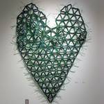 Naoko Morisawa makes garden hose sculptures for public art projects. This sculpture, titled Love Is All You Need, is shaped like a heart.