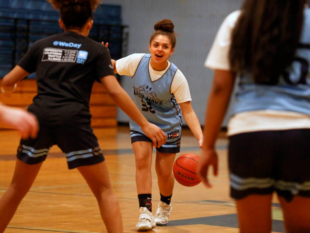 Soriah Swinton calls a play during practice at Meadowdale High School in Lynnwood on Feb. 20. (Kevin Clark / The Herald)