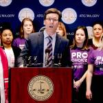 Washington state Attorney General Bob Ferguson speaks at a news conference on Monday in Seattle announcing a lawsuit challenging the Trump administrations Title X gag rule, which would affect federal funding for reproductive health care and family planning services. (AP Photo/Elaine Thompson)