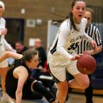 Glacier Peaks Maya Erling comes up with a steal during a Class 4A Wes-King Bi-District Tournament game earlier this month. The Grizzlies thrive on a swarming full-court press, allowing just 38.3 points per contest. (Kevin Clark / The Herald)
