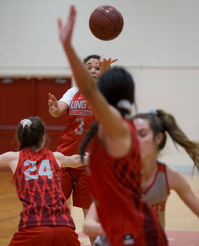 Jada Wynn passes to a teammate during Mondays practice. The Kings freshman grew up playing in the post before transitioning to guard two years ago. (Andy Bronson / The Herald)
