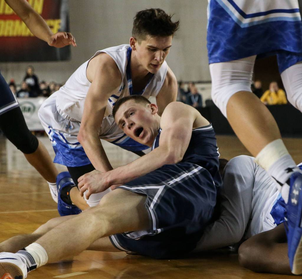 Glacier Peaks Evan Mannes calls for a timeout against Curtis Wednesday afternoon at the Tacoma Dome on February 27, 2019. The Grizzles lost 46-43. (Kevin Clark / The Herald)