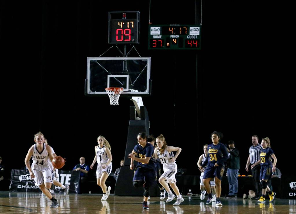 Arlingtons Keira Marsh makes a break for the open court on a fast break against West Seattle Wednesday afternoon at the Tacoma Dome on February 27, 2019. The Eagles lost 50-45. (Kevin Clark / The Herald)