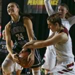 Edmonds-Woodways Rebekah Dasalla is tied up by Prairies Haley Reed Thursday morning at the Tacoma Dome on February 28, 2019. The Warriors lost 58-39.(Kevin Clark / The Herald)