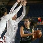Edmonds-Woodways Maddie McMahon is confronted by a wall of Prairie defenders Thursday morning at the Tacoma Dome on February 28, 2019. The Warriors lost 58-39.(Kevin Clark / The Herald)