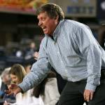 Jon Rasmussen, Edmonds-Woodway head coach, celebrates a 3-pointer Thursday morning at the Tacoma Dome on February 28, 2019. The Warriors lost 58-39.(Kevin Clark / The Herald)