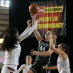 Edmonds-Woodways Adrienne Poling attempts a floater over Prairie defense Thursday morning at the Tacoma Dome on February 28, 2019. The Warriors lost 58-39.(Kevin Clark / The Herald)