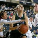 Edmonds-Woodways Rebekah Dasalla drives the baseline with Prairies Allison Corral reaching in with Haley Reed looking on Thursday morning at the Tacoma Dome on February 28, 2019. The Warriors lost 58-39.(Kevin Clark / The Herald)