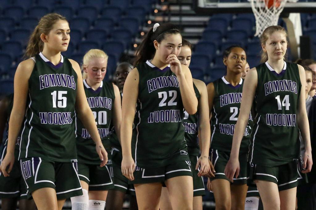 Edmonds-Woodway walks off the court after loosing to Prairie Thursday morning at the Tacoma Dome on February 28, 2019. The Warriors lost 58-39.(Kevin Clark / The Herald)