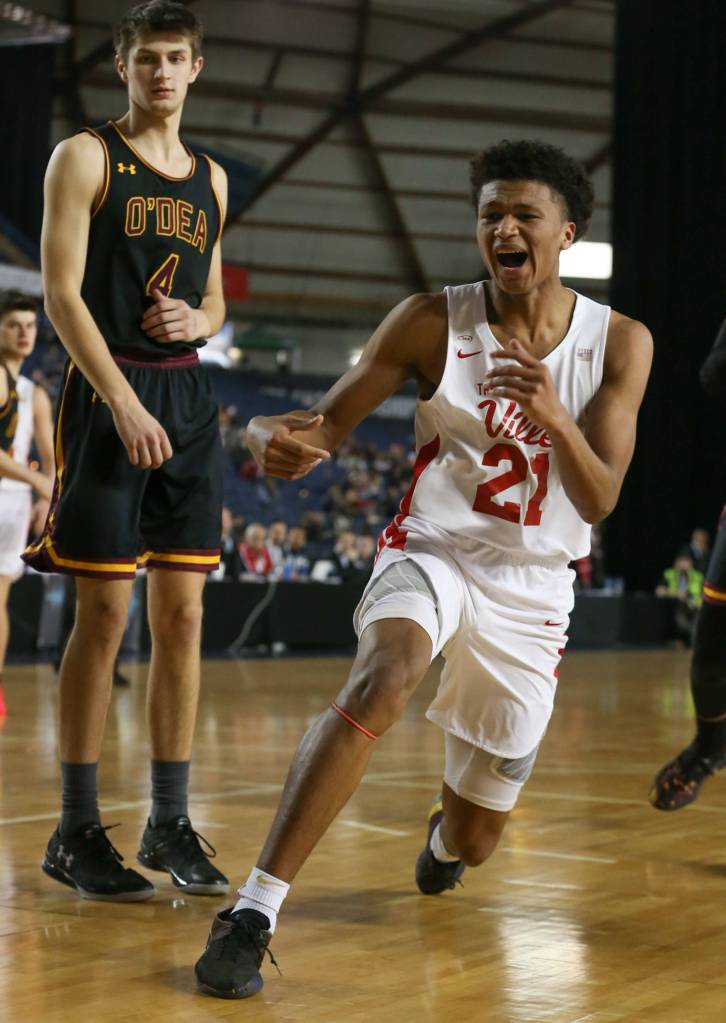Marysville-Pilchucks RaeQuan Battle reacts after fumbling the ball off of bounds with ODea John Misel looking on Thursday afternoon at the Tacoma Dome on February 28, 2019. The Tomahawks lost 63-53. (Kevin Clark / The Herald)