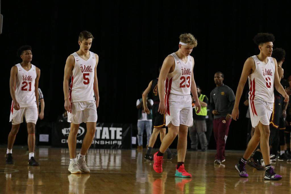 Marysville-Pilchuck walk off the court after loosing to ODea Thursday afternoon at the Tacoma Dome on February 28, 2019. The Tomahawks lost 63-53. (Kevin Clark / The Herald)